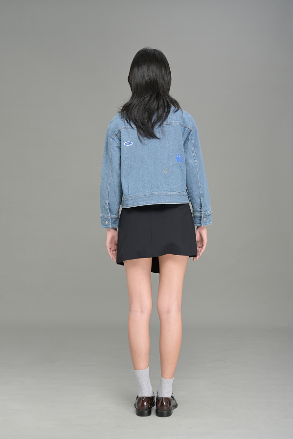 Subtle embroidered back detail for a clean signature finish.